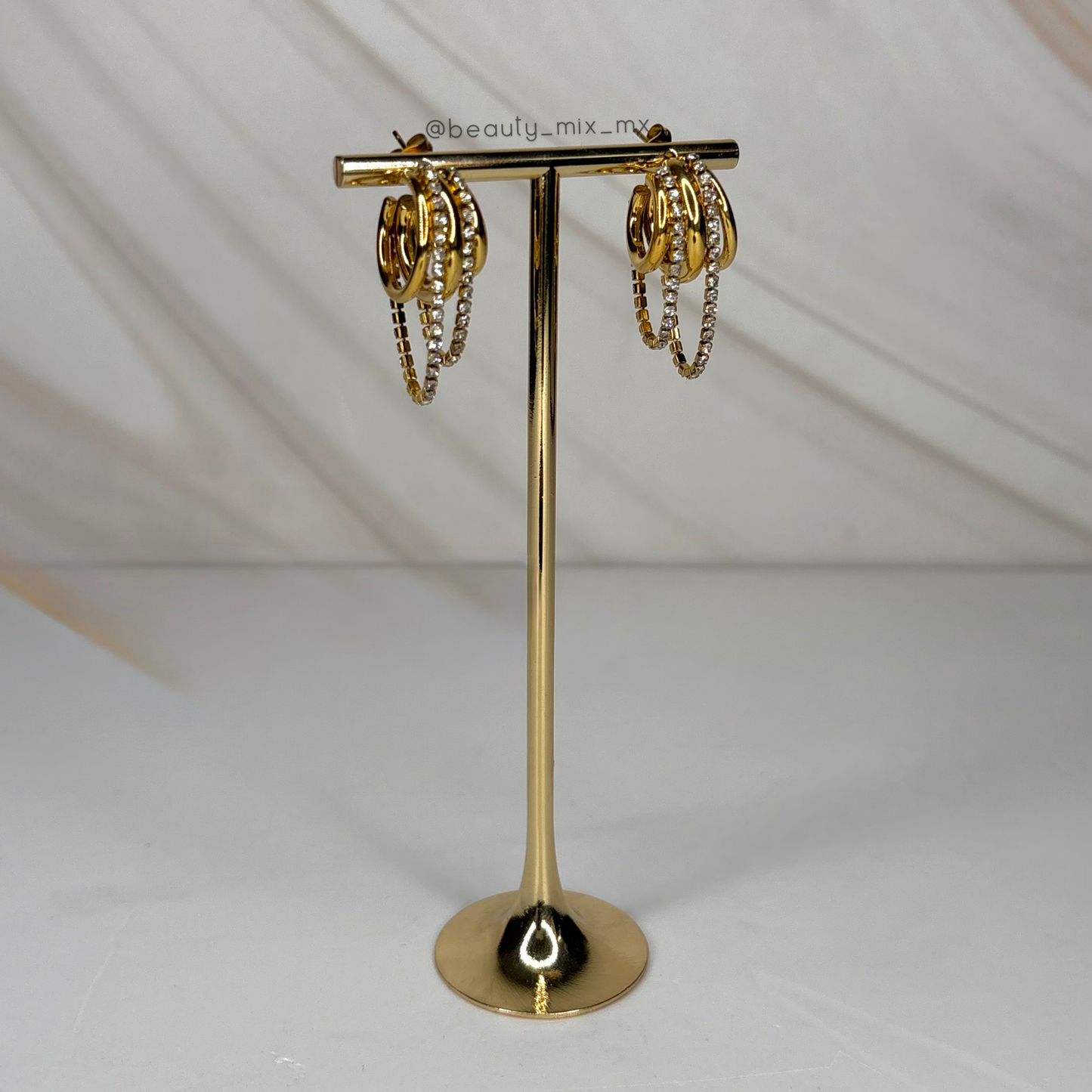 Aretes 62 Dorado (Arracada triple con zirconias)