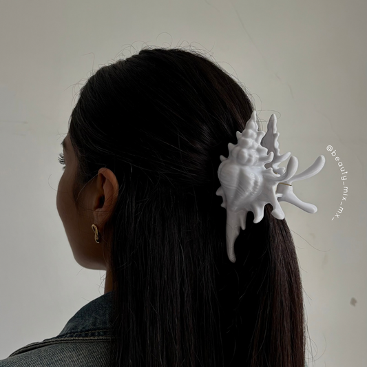 Pinza caracol blanco