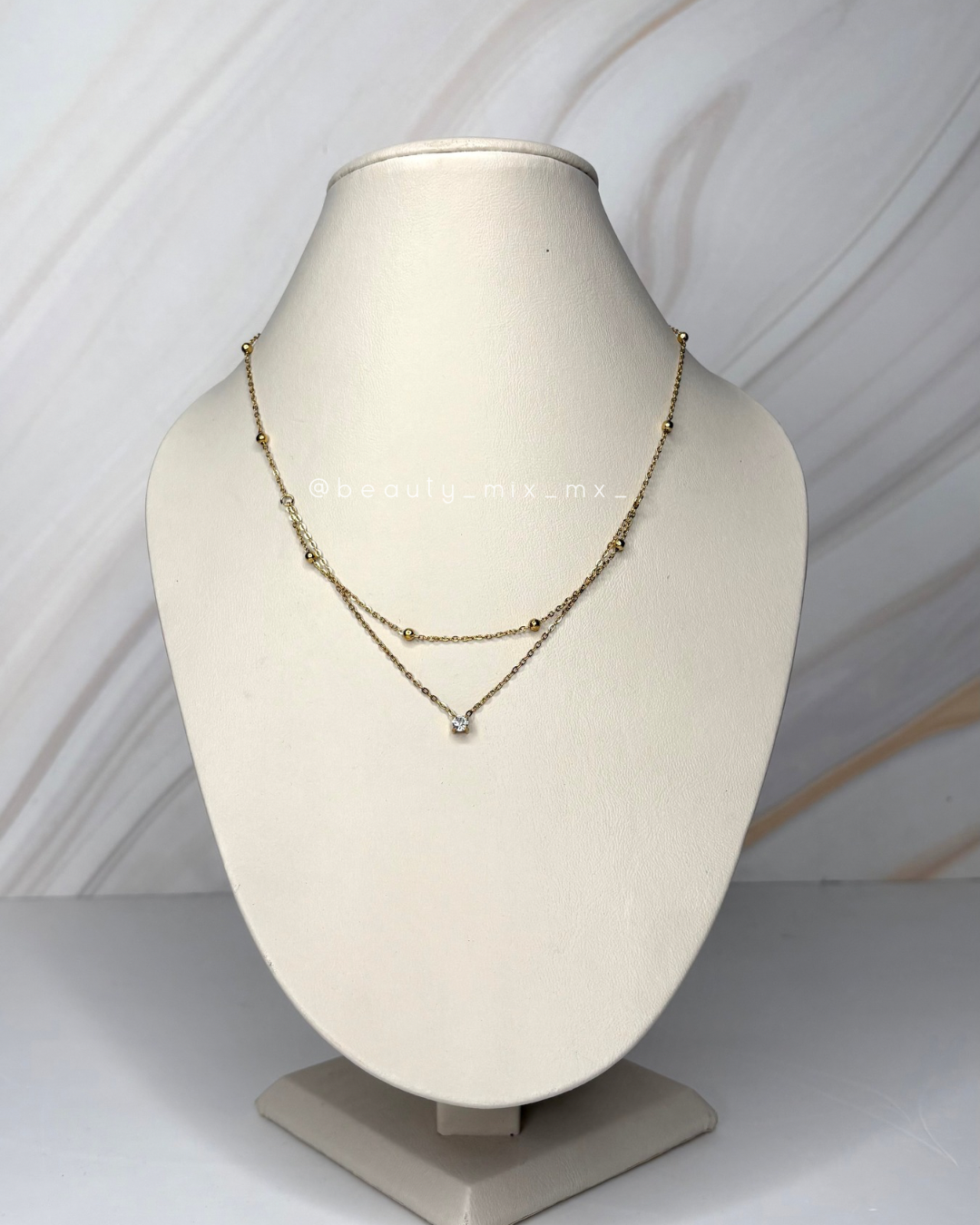 Collar 33 Dorado doble con zirconia