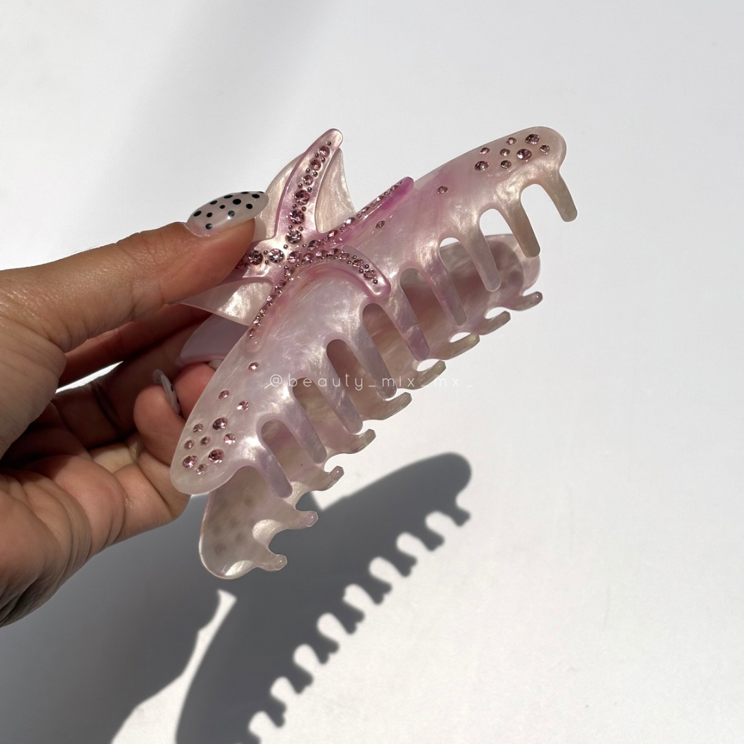 Pinza estrella de mar rosa