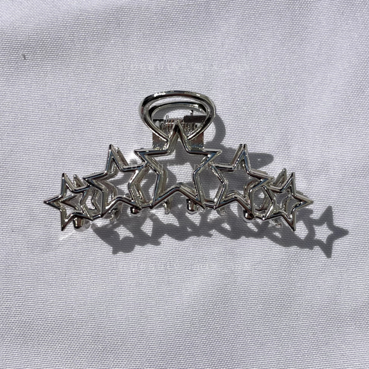 Pinza estrellas plateada